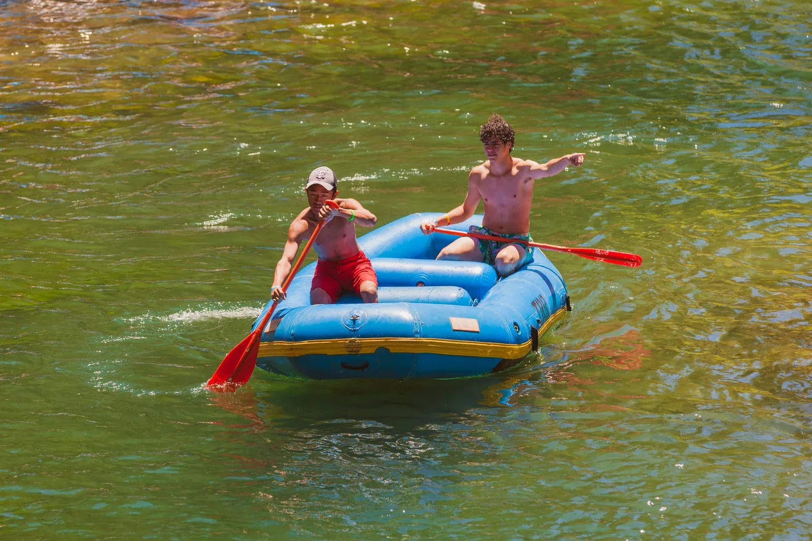 Two guests enjoying a calm section of the Truckee River