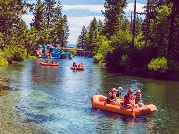 Guests floating the Truckee River near the River Ranch Lodge