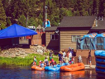 The Truckee River Raft Co. launch area with its blue shade tent