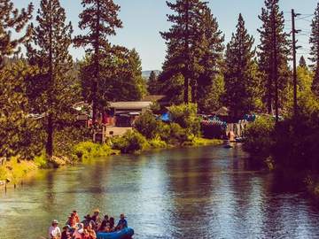 A raft working the rapids at the end of the Truckee River float